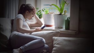 woman looking at phone