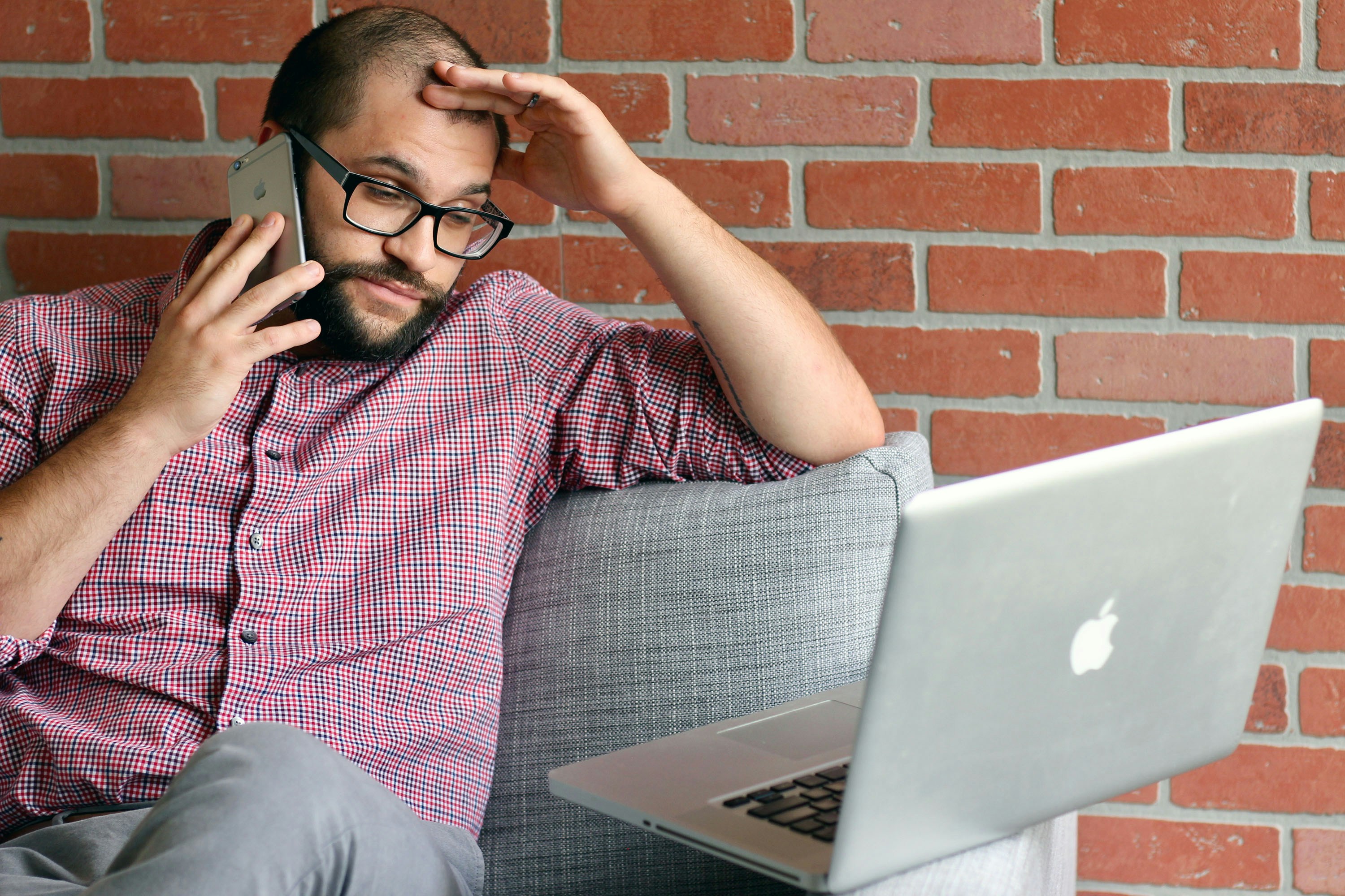 person looking confused using a computer